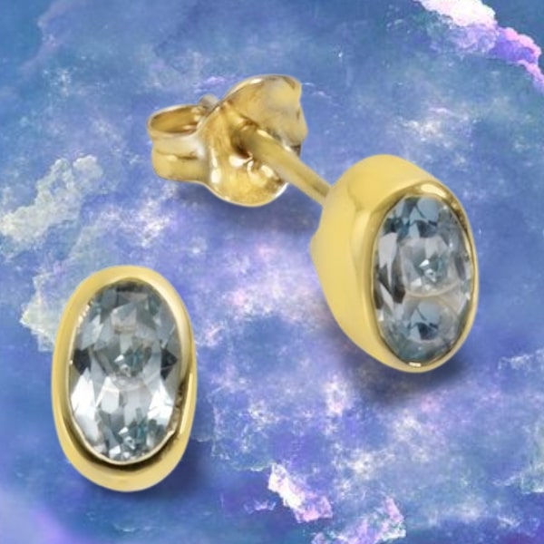 333 Gold Ohrstecker mit je einem Blautopas Stein